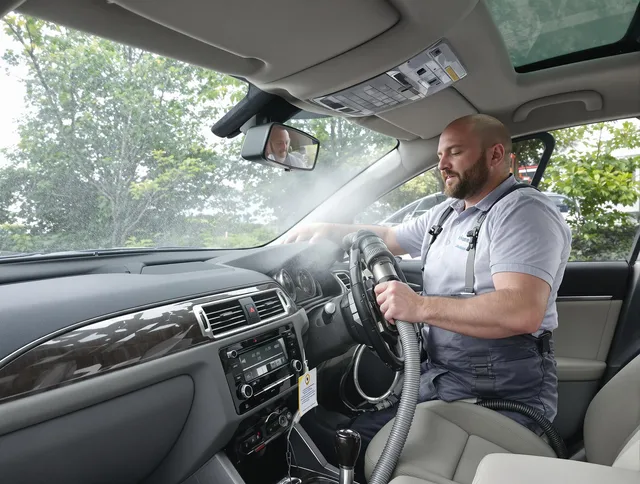 Barrington Air Duct Cleaning specialist performing professional car duct cleaning in Barrington
