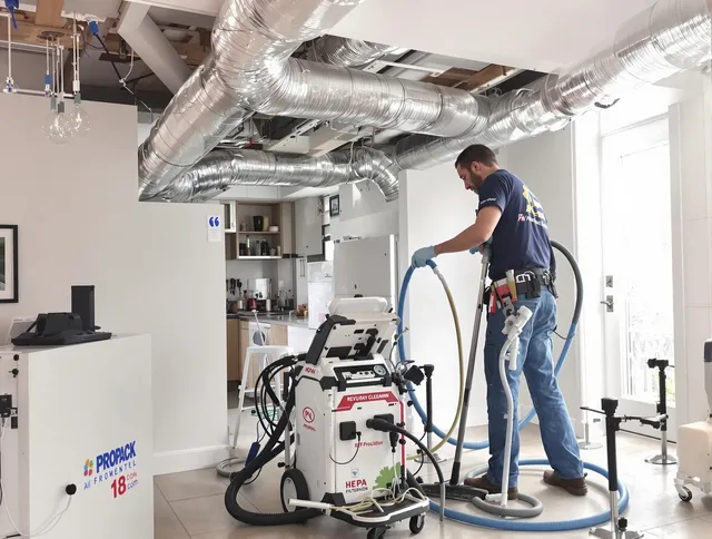 Barrington Air Duct Cleaning technician performing advanced pure duct cleaning with specialized equipment in Barrington